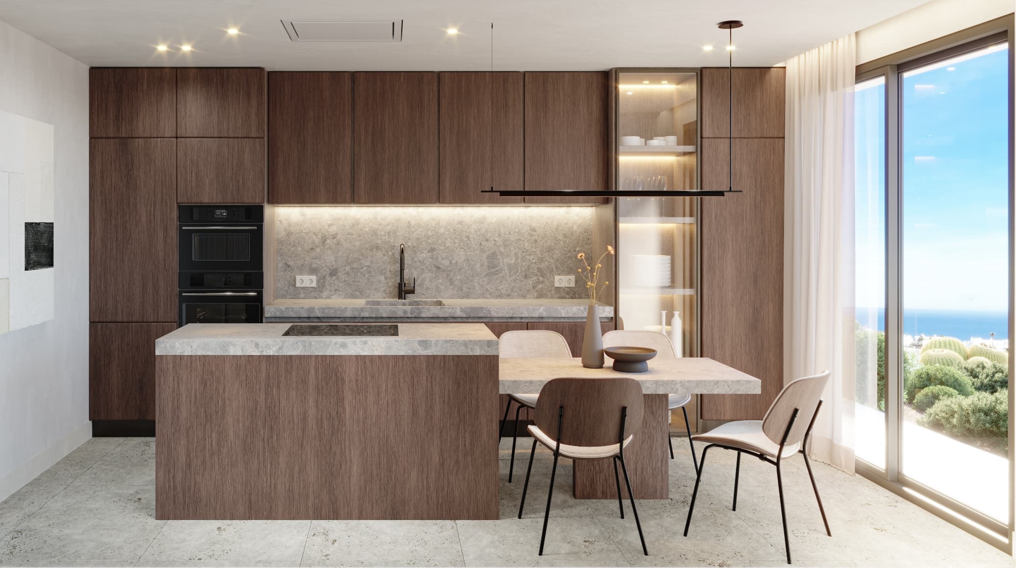 Contemporaneo_cocina-1 - MiraCasa Modern kitchen with dark wood cabinets, marble countertops and an island, overlooking an ocean view through large windows.