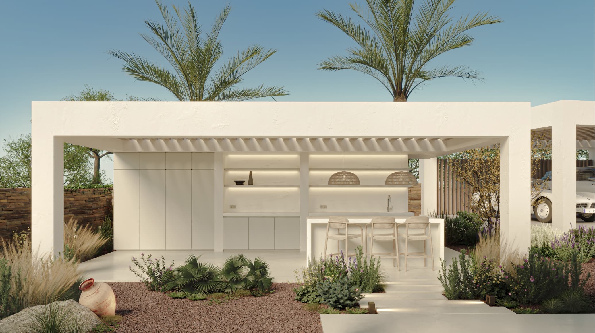 Natural_bbq - MiraCasa Modern white outdoor kitchen under a flat pergola with built-in cabinets, a bar counter with stools, and woven pendant lights against a desert landscape with palm trees and blue sky.