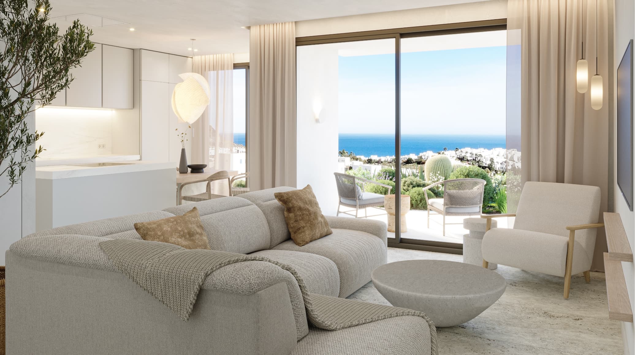 Bright contemporary living room with a beige sectional, soft textiles, and floor-to-ceiling windows showing an ocean view.