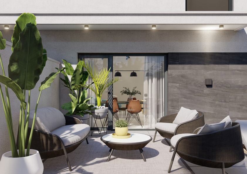 Oasis-Los-Pinos-II-Inalgra-Huercal-de-Almeria-15 - MiraCasa Modern outdoor patio with wicker seating around a round coffee table, potted plants, and a glass sliding door leading to a dining area.