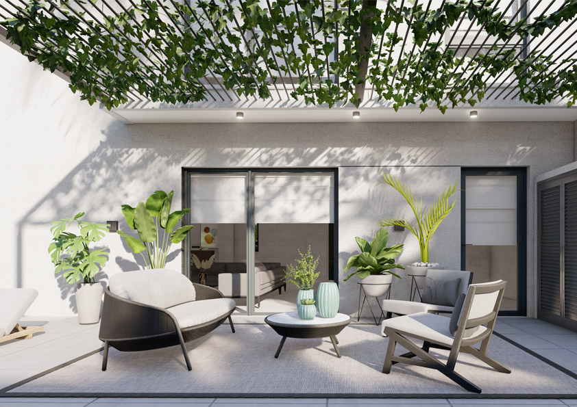 Oasis-Los-Pinos-II-Inalgra-Huercal-de-Almeria-17 - MiraCasa Contemporary outdoor patio with wicker armchairs, a round coffee table, and lush potted plants in front of sliding glass doors.