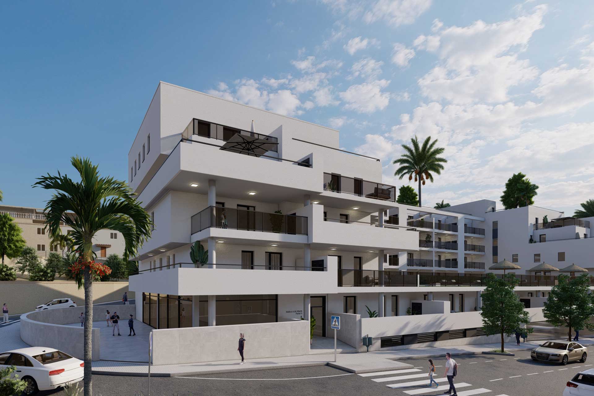 Modern white multi-story apartment building with glass balconies along a palm-lined street.